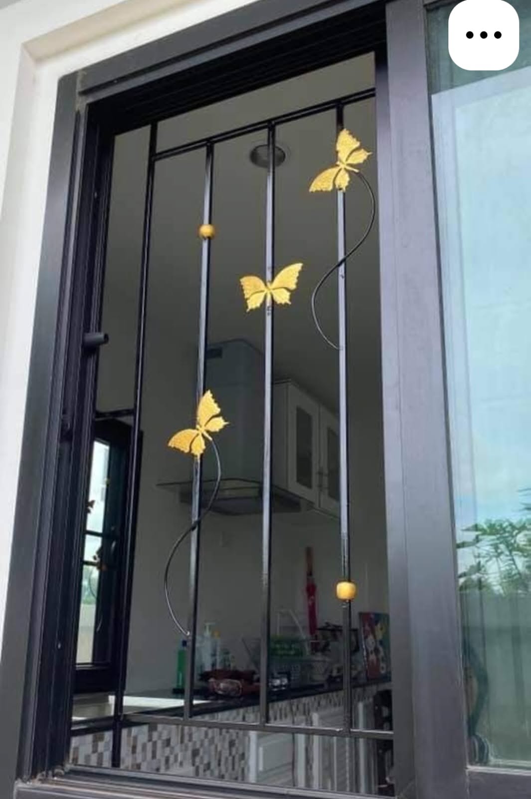 Modern Window Grill with Yellow Butterfly Decorations