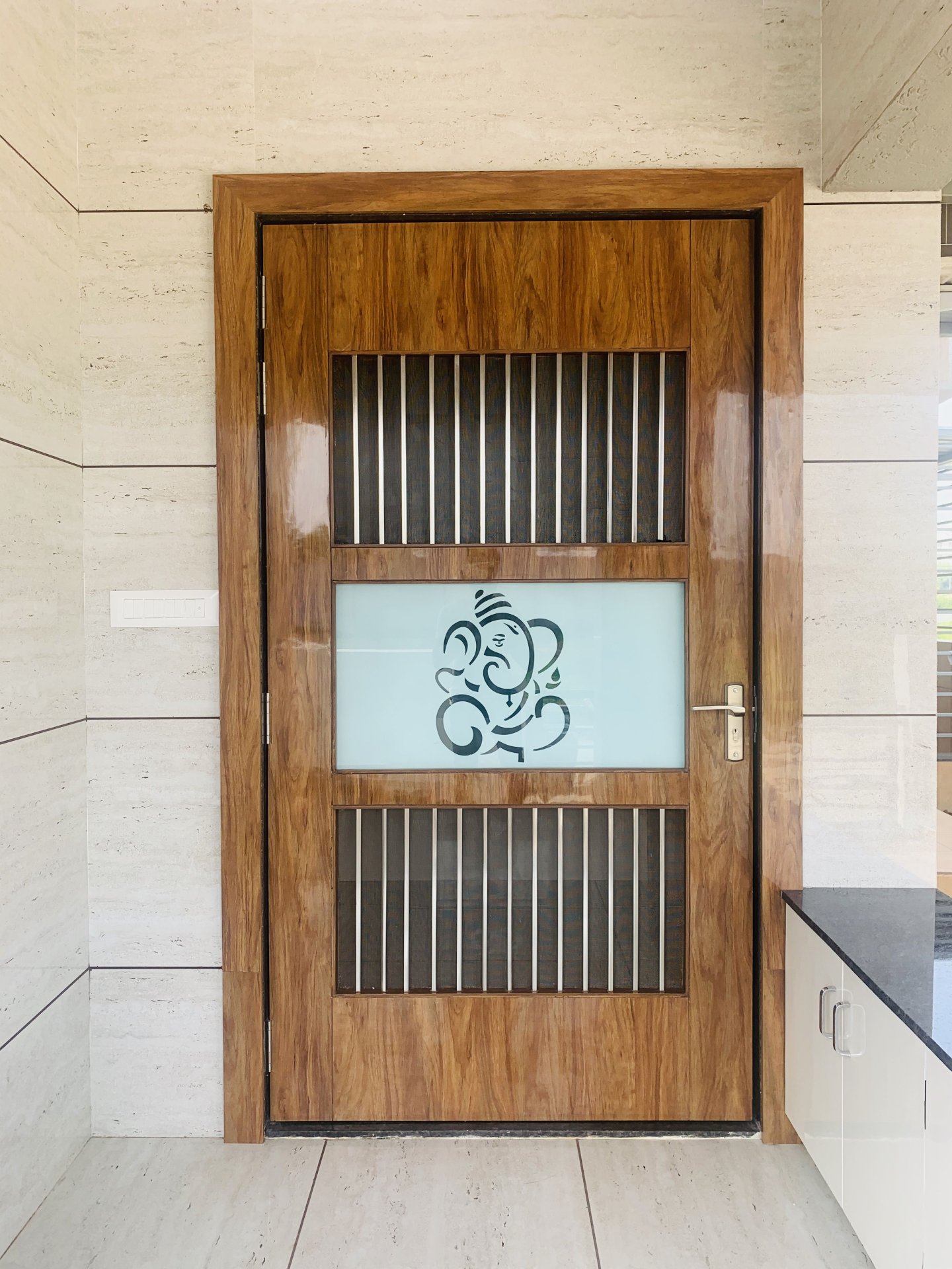 Modern Wooden Entry Door with Frosted Glass Ganesh Motif